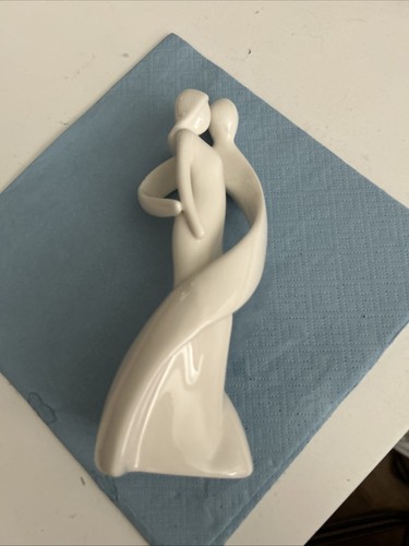 White porcelain figurine - porcelain,
