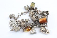 Mixed Grade Silver Charm Bracelet Heart Padlock Telephone Box Ice Skating (88g)