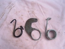 TRIUMPH PRE UNIT DUPLEX STAND BRACKET AND SPRING AND REAR BRAKE ARM SPRING.