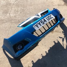 VAUXHALL TIGRA 1.4 PETROL FRONT BUMPER PANEL TRIM BLUE SURROUND 2004 - 2009