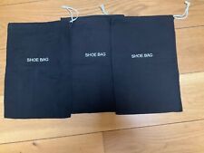 THREE BLACK SHOE BAGS