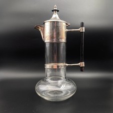 Glass decanter with silver