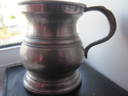 Antique measure stamped half - antique,