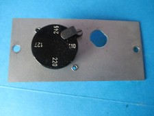 VINTAGE VOLTAGE SELECTOR ON PLATE.