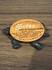ANTIQUE CAST IRON CELLULOID