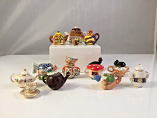 Collection of Dolls house miniature Tea Pots,  Xmas Pudding, Elephant, cottages