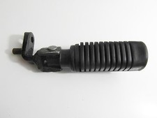 Footrest holder detent front