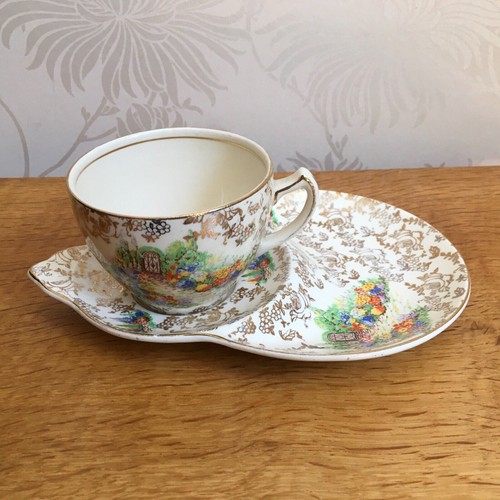 Tea cup saucer side - side, h