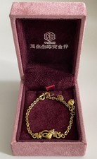 Vintage 24ct Chinese gold baby