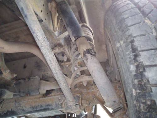 Rear left shock absorber - rear,