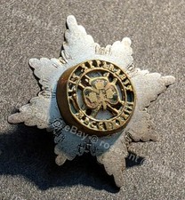 tiny vintage Irish Guards - lapel Badge with pierced centre Motto & Clover leaf