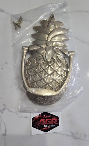 Brass pineapple front door - front,