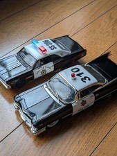 2 American mini cars Cadillac