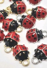 12 red ladybird enamel charms