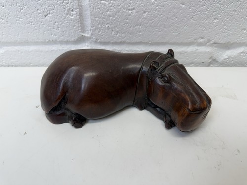 Wooden hand carved dark - wooden,