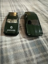 Two Corgi Jaguar Toy Cars