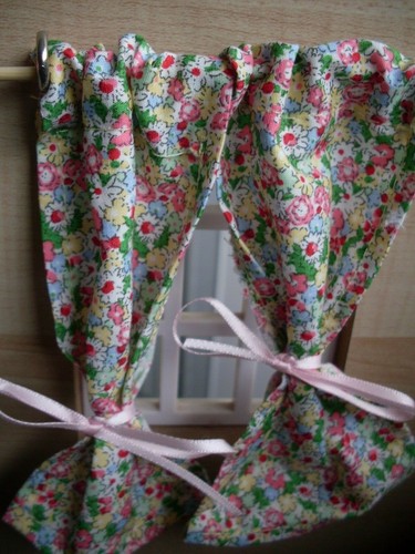 Flowered dolls house - dolls,