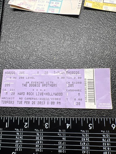 Concert ticket stub unripped - concert,