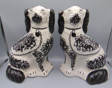 PAIR OF ANTIQUE STAFFORDSHIRE BLACK & WHITE SPANIEL WALLY DOGS