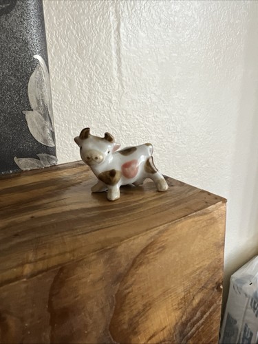 Small ceramic collectible cow - small,