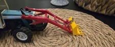 BRITAINS LTD 9574 FRONT END LOADER WITH ATTACHMENTS IN GOOD WORKING CONDITION 