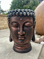 Large buddha head garden - x,