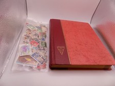 vintage French stockbook with lots of stamps