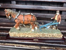 antique horse drawn carriage ploughing
