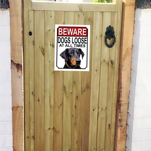 Beware dogs loose all times - at,