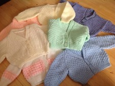 Hand knitted baby - hand,