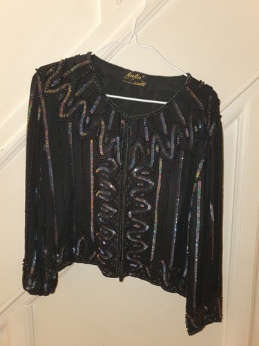 Kuku sudi heavily sequinned - by,