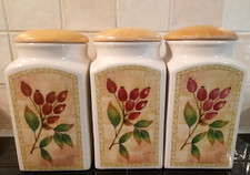 THREE VINTAGE MARKS AND SPENCER CERAMIC FRUIT DESIGN STORAGE JARS.