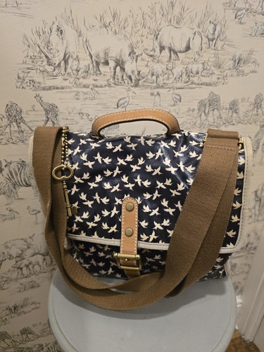 Fossil navy blue bird - fossil,