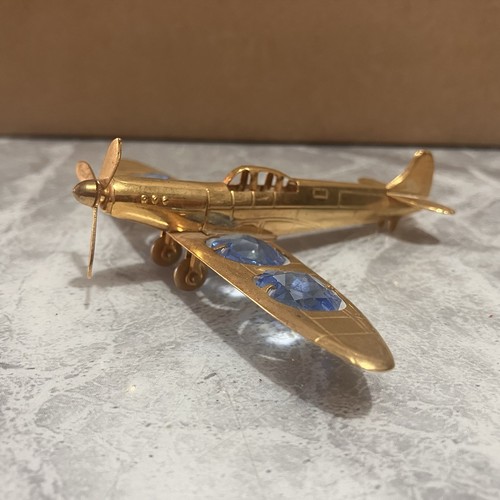 Gold tone spitfire fighter - tone,
