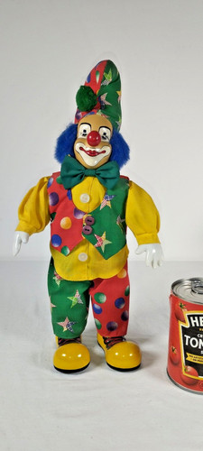 Porcelain faced clown - faced, doll