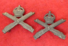 Pair of Machine Gun Corps collar badges