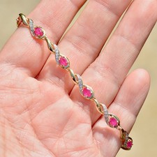 Ruby and Diamond 9ct Yellow Gold Infinity Design Bracelet