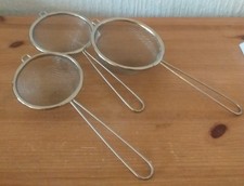 SET OF THREE SMALL METAL HAND SIEVES