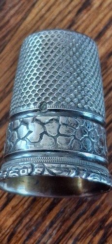 Antique silver thimble with