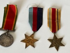 SET OF 3 WW2 MEDALS ALL NAMED AFRICA STAR, 1939-45 STAR AFRICA SERVICE MEDAL.