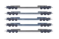 TRIANG 'OO' GAUGE RAKE OF 5 GREY ASSORTED FLAT TRESTROL WAGONS