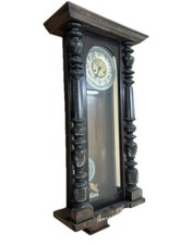 2 Key hole mahogany wall clock, with key and pendulum Wooden