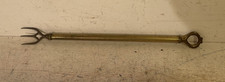 A vintage brass telescopic extending toasting fork