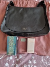 RADLEY LONDON BLACK LEATHER HANDBAG IN NEW CONDITION WITH TWO BOTTLES OF PERFUME