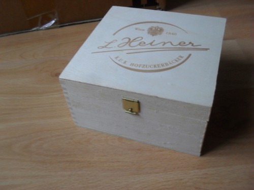 Small wooden box with hinged