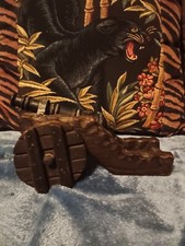 Vintage cast iron and wood decorative cannon,rustic look.