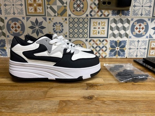 Black and white heelys brand - and,