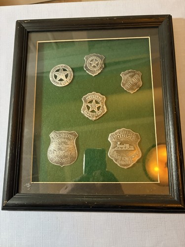 Framed old west badges - framed,