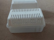 two large water absorbent containers.plastic boxes.