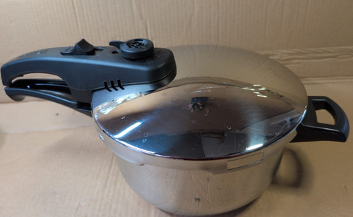 Pressure cooker with steamer - with,